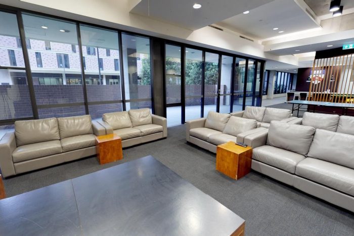 2023 11 Basser College Basser Common Room Tv And Stage Area.cropimg.width=700.crop=basic